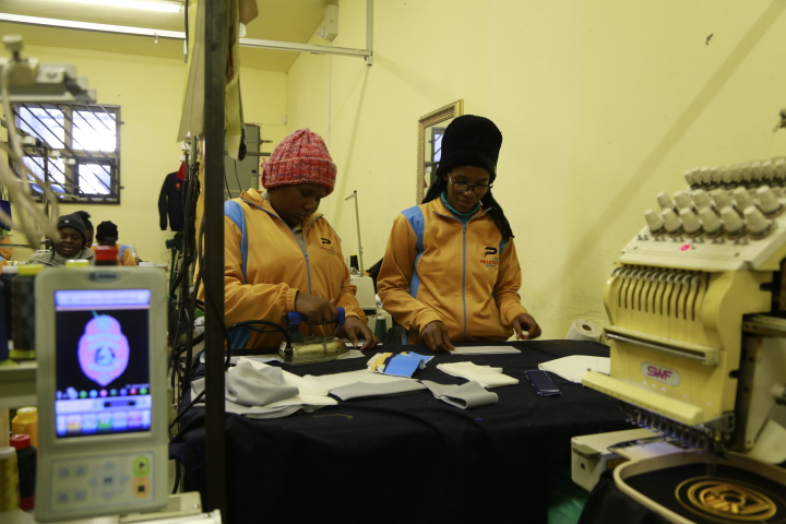 Philetrix Fashions team working in the garment workshop